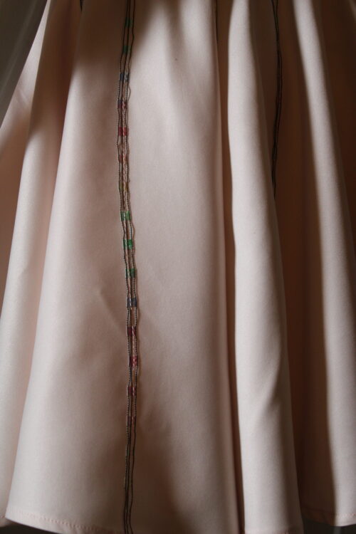 Pale pink mini skirt