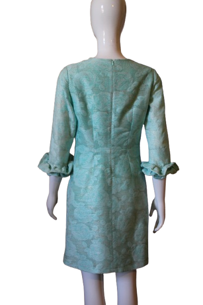 A mint green color dress
