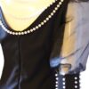 Black-dress-peals-back