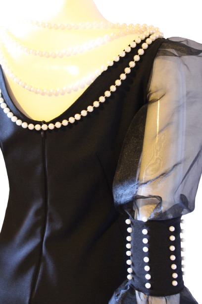 Black-dress-peals-back